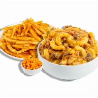 The Burger And Fries · Our signature Cheese Burger mac served with your choice of signature sides.