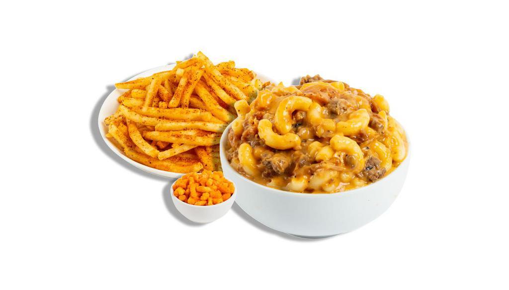 The Burger And Fries · Our signature Cheese Burger mac served with your choice of signature sides.