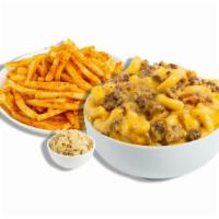 The Works · Our hearty Meat Lover mac served with your choice of signature sides.