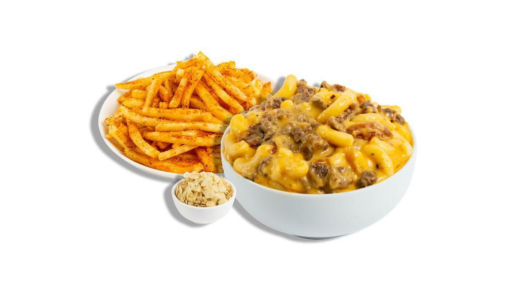 The Works · Our hearty Meat Lover mac served with your choice of signature sides.