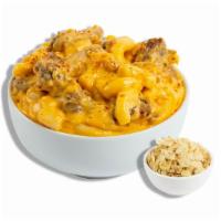 The Slow Cooker · 12 hour braised pork carnitas tossed in our classic cheddar cheese blend, pepper jack cheese...