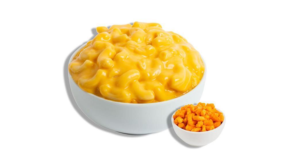 The Basic · Our classic cheddar cheese blend with a pinch of our secret spice blend, because everyone has a little bit of basic in them. Recommended topper: Classic Cheetos