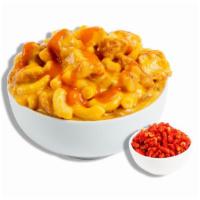 The Buffalo Chicken · All white meat chicken chunks tossed in our signature sharp cheddar cheese blend with a whac...