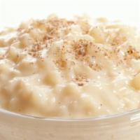 Rice Pudding · Creamy spiced milk based pudding with rice.