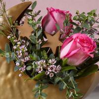 Sun Moon Stars Bouquet  · Beautifully Arranged Moon and Star shaped container with Roses and other flowers. Perfect fo...