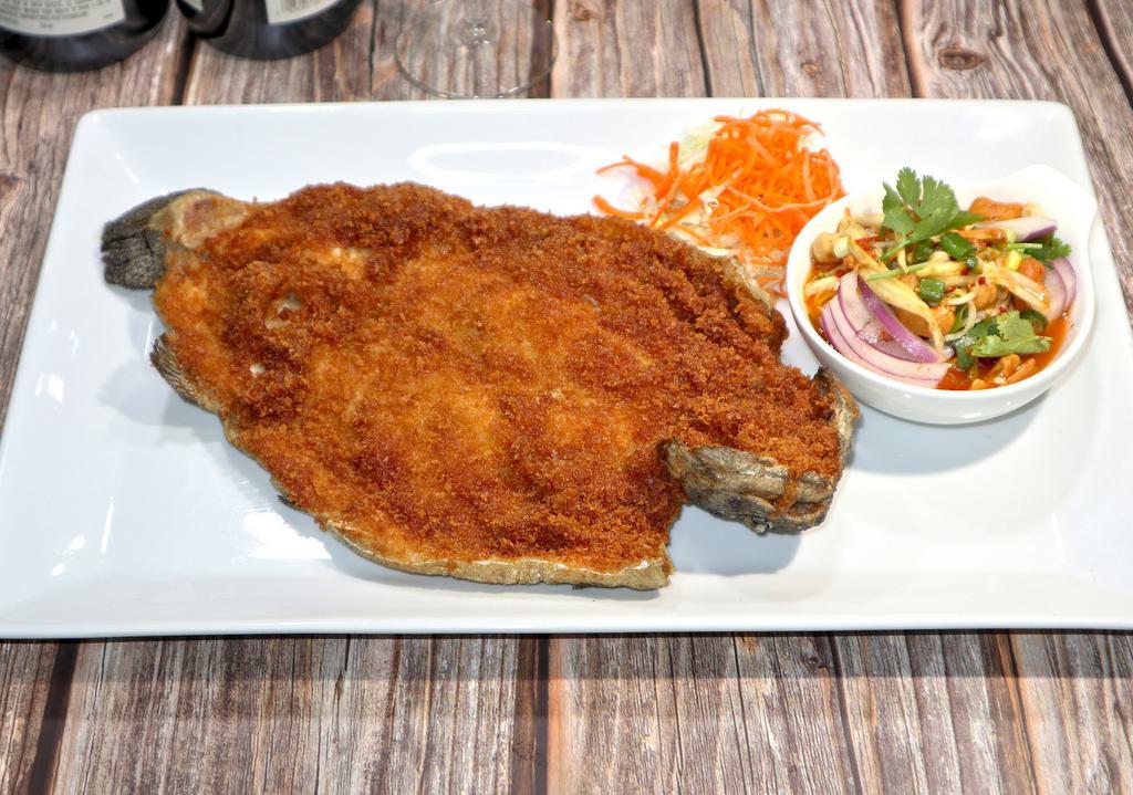 Deep-Fried Trout Fish · Deep-fried trout fish served with delicious tangy mango sauce.