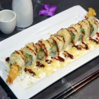 Crunchy Roll · Shrimp tempura, avocado and asparagus inside topped with crunchy flakes and sweet eel sauce.