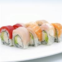 Rainbow Roll · 8 pcs. California roll topped with Bluefin tuna, Yellowtail, Salmon, Albacore and Shrimp.