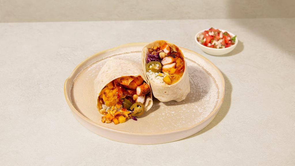 Squash Burrito · Burrito with your choice of protein, butternut squash, corn, white rice, jalapenos, shredded cabbage, and salsa.