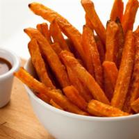 Sweet Potato Fries · Hand cut sweet potatoes fried until crisp and golden.