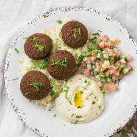 Falafel · Fried mashed chickpeas, vegetables and house spices.