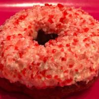 Strawberry Cream Cheese · Our soft strawberry cake donut topped with our housemade cream cheese glaze and crushed stra...