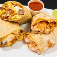 Hash Brown Burrito · Two eggs, sausage, bacon, hash brown, cheese and sour cream.