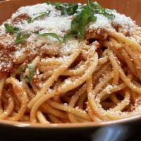 Spaghetti Marinara · Carmelina tomatoes simmered with fresh herbs Italian spices.