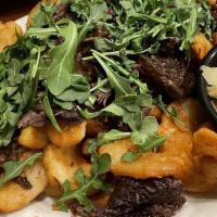 Short Rib Fries · Sidewinder fries with boneless marinated short ribs with truffle oil, shaved Parmesan, and a...