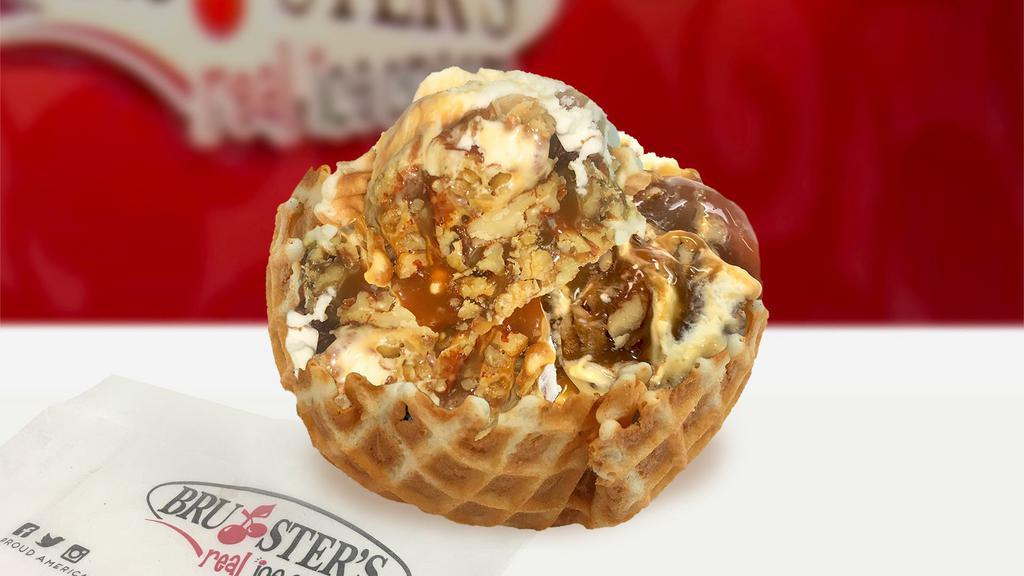 Large Waffle Bowl · 4 scoops of  ice cream, flavors of your choice, served in a freshly made waffle bowl.