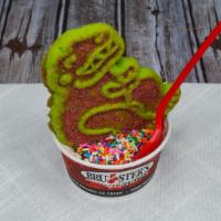 Dino Sundae · Vanilla ice cream, chocolate syrup, sprinkles, and a Dino cookie.