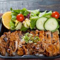 Chicken Teriyaki Plate · Includes rice, green onions, and salad.
