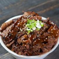 Beef Teriyaki Bowl · Includes rice, and green onions.