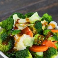 Veggie Teriyaki Bowl (No Meat) · Steamed veggies with rice and green onions.