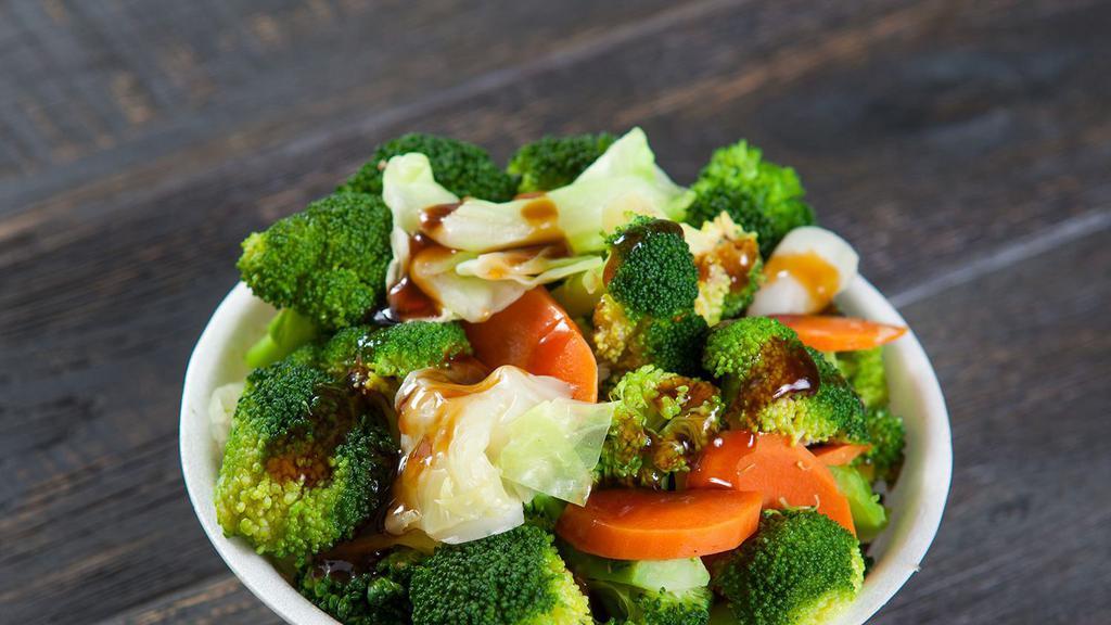Veggie Teriyaki Bowl (No Meat) · Steamed veggies with rice and green onions.