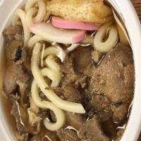 Udon · Pork slices, Japanese fish cake, tofu, green onion, seaweed, and udon noodles.