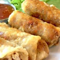 Crispy Spring Rolls · 2 or 4 pieces. Pork, vermicelli, carrots in rice wrapper with lettuce with sweet chili sauce.