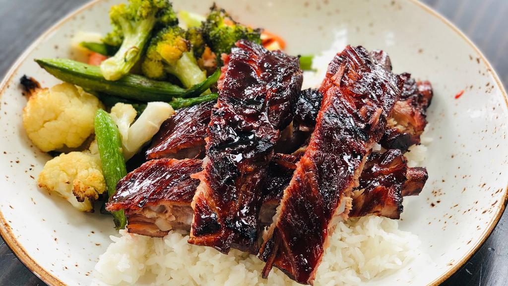 Honey Glazed Spare Ribs · Top Menu Item. Braised overnight, the moist and tender meat falls right off of our pork ribs, seasonal vegetables & steamed rice.