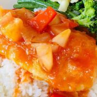 Sweet & Sour Fish Fillet · Crispy fish fillet with tangy sweet and sour sauce, pineapple, bell peppers, onions, seasona...