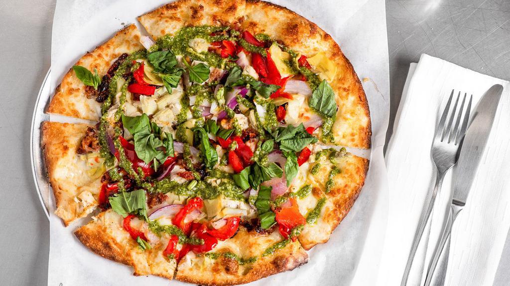 Pesto Chicken · Chicken, blanca sauce, 50/50 Mozzarella blend, roasted red peppers, sun-dried tomatoes, artichoke hearts, fresh basil, red onions, and bacon. Option finishing sauce of pesto.