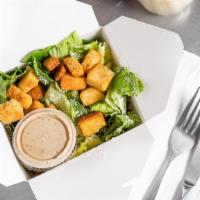Half Caesar Salad · Crisp romaine lettuce with parmesan cheese and croutons