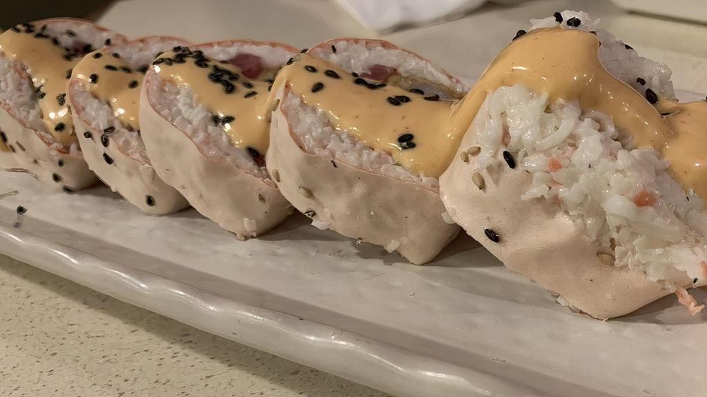 5 Piece Tropical Roll · Spicy. Soy paper wrap with imitation crab, tuna, mango shrimp tempura, lemon, and spicy mayo.