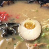 Miso Ramen · Pork based broth with miso flavoring comes with chashu and half an egg. Also has cloud ear m...