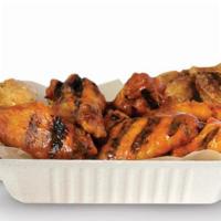 50 Wings · 50 crisp boneless wings or classic (bone-in) wings with up to 4 flavors