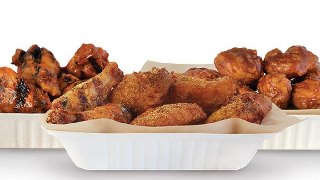 100 Wings · 100 crisp boneless wings or classic (bone-in) wings with up to 6 flavors.