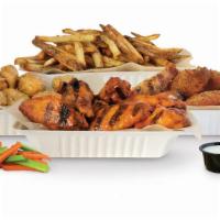 24 Pieces Family Pack · Choice of 24 crisp boneless wings, classic-bone-in, or a combination of boneless and bone-in...