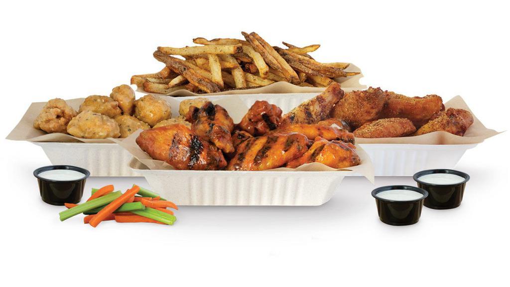 24 Pieces Family Pack · Choice of 24 crisp boneless wings, classic-bone-in, or a combination of boneless and bone-in wings with up to 3 flavors, 3 dips, large hand-cut fries, veggie sticks. Feeds 3-4.