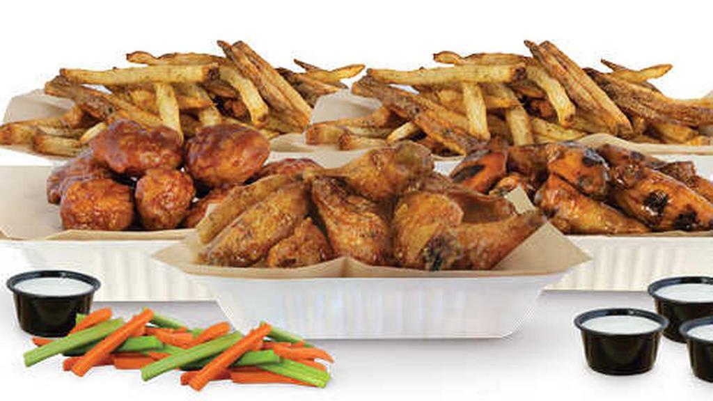 50 Pcs Party Pack · Choice of 50 crisp boneless wings, classic (bone-in), or a combination of boneless and bone-in wings with up to 4 flavors, 4 dips, 2 large hand cut fries, 2 veggie sticks. (Feeds 6-9)