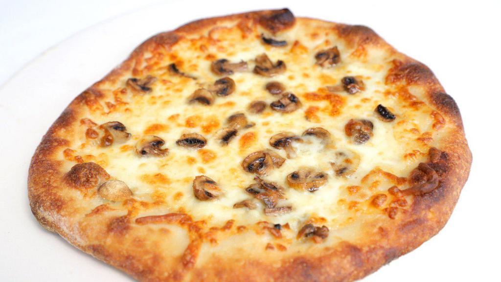 Truffle Mushroom Pizza · Mushrooms, white truffle oil, Alfredo sauce.