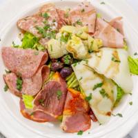 Antipasto Salad · Assorted cold cuts, cheeses, artichokes, and olives served over a bed of lettuce.