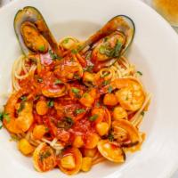 Linguine Frutti Di Mare Dinner · Linguine pasta in a light red sauce served with mussels, clams, shrimps, and bay scallops.