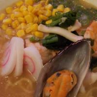 Seafood Ramen · Classic flavored seafood broth topped with succulent prawns, calamari, naruto, sweet corn, c...