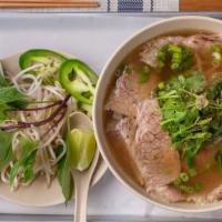 The Brisket Pho · Stewed for 24 hours with beef rib bones, and served with sliced slow-braised brisket.