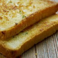 Toast · Delicious golden and toasted brown bread.