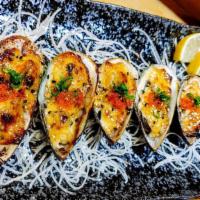 Baked Mussel · Six pieces. Green mussel baked with dynamite sauce, topped with green onion and masago.