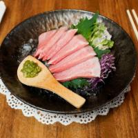 Toro Sashimi · Piece of tuna.