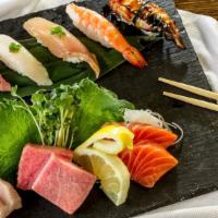 Sushi & Sashimi Combo Set 2 · Seven pieces of sushi: tuna, salmon, albacore, ebi shrimp, white fish, yellowtail, and eel, ...