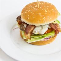Hamburger · 1/3 lb. hand made patty with thousand island dressing, lettuce, tomatoes, red onions, & pick...