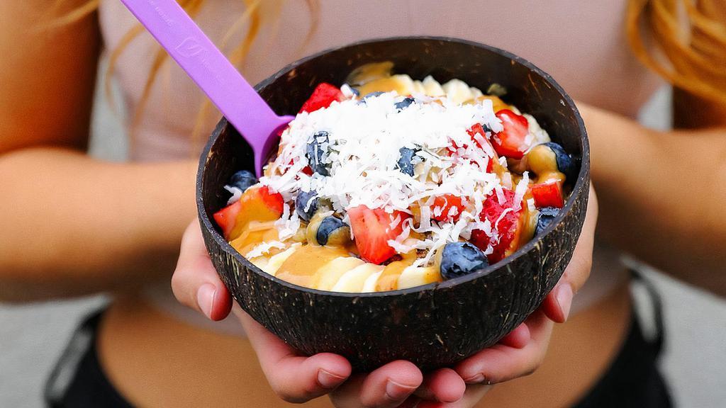 Bako Bowl · Comes with granola, banana, strawberries, blueberries, coconut shaving, honey and butter.