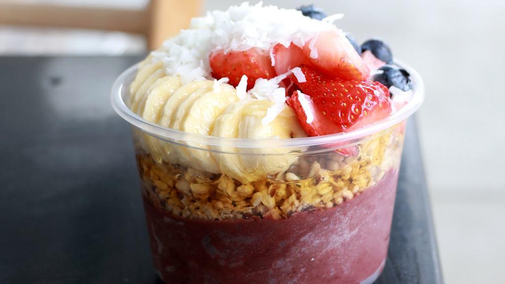 Patriot Bowl · Served with granola, bananas, strawberries, blueberries, coconut shavings, and honey.